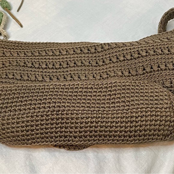 The Sak Crochet Shoulder Bag in Cognac color. Crochet Flower detail on zipper. - Picture 5 of 10